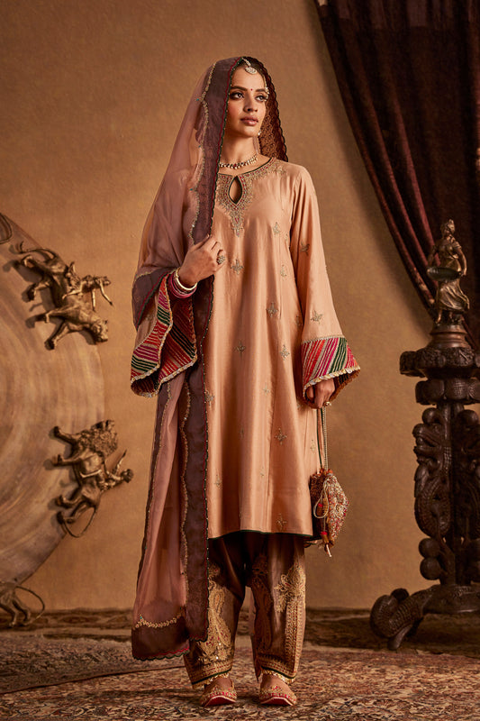Woman in French Beige Kurta Set, elegant ethnic wear, traditional South Asian fashion, full length