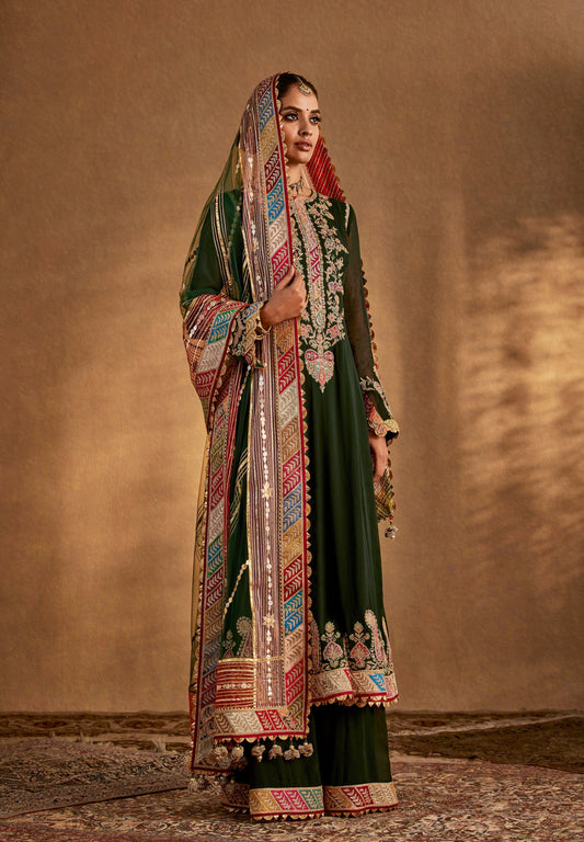 Dark green designer salwar suit with embroidered dupatta – elegant Indian ethnic wear for weddings and festive occasions.