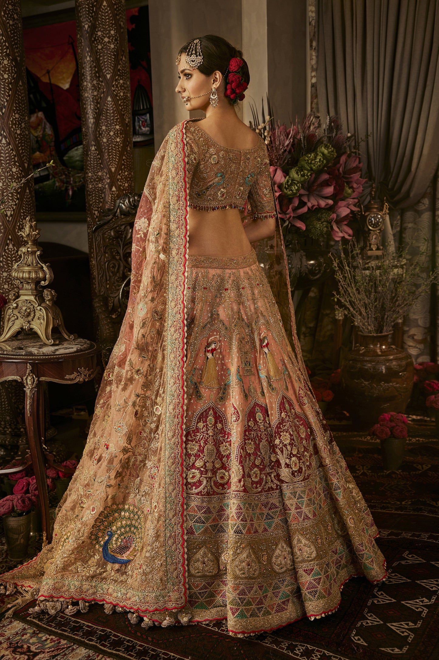 Peach Hued Dancing Figures Lehenga