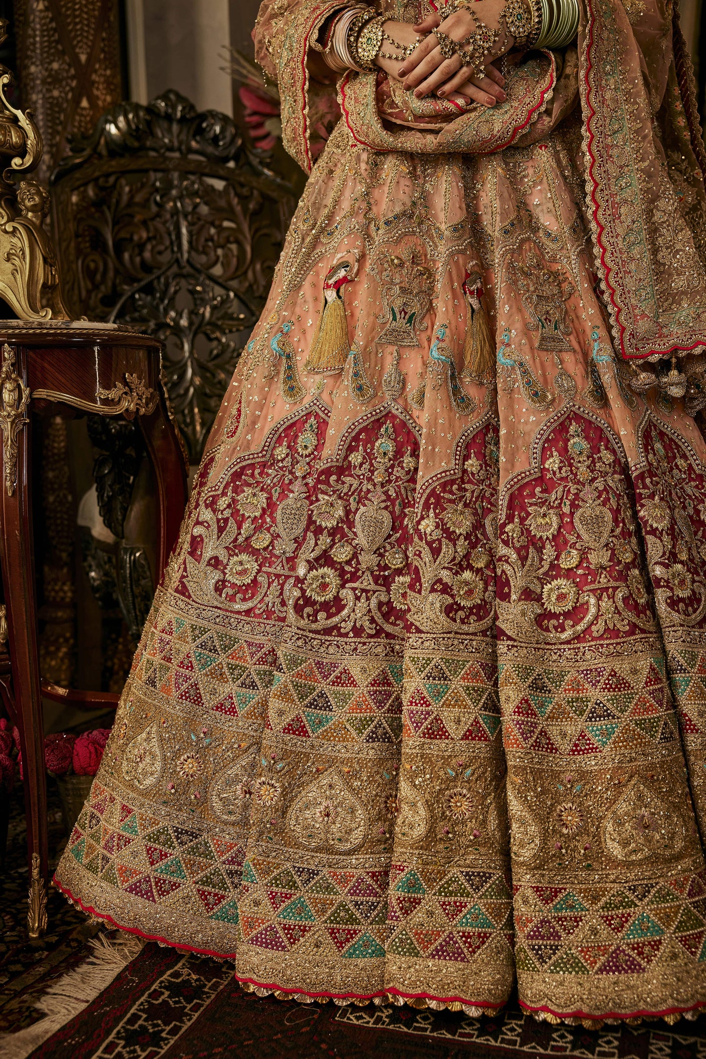 Peach Hued Dancing Figures Lehenga
