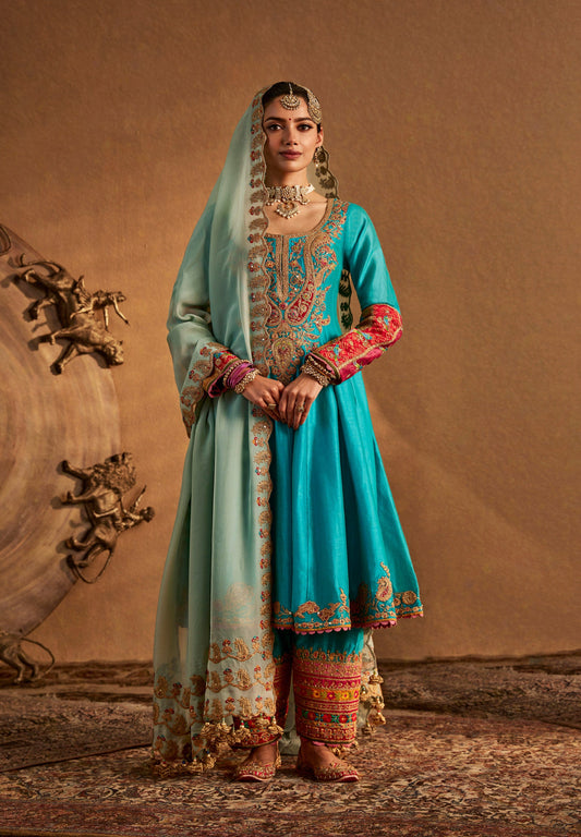 Beautiful turquoise ethnic Kurta Set with pink-gold embroidery and dupatta, ideal festive and wedding outfit.
