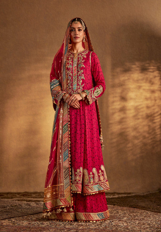 Pink designer salwar suit with heavy embroidery – traditional Punjabi ethnic wear perfect for weddings and festive functions.