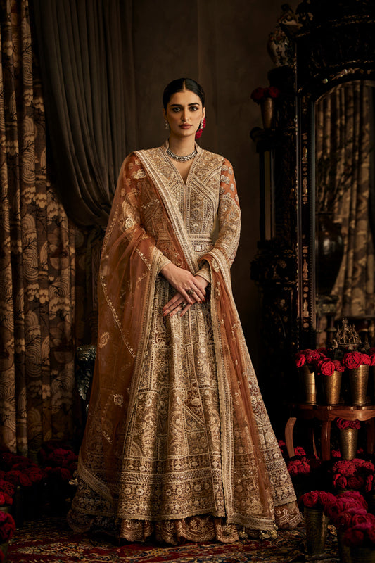 A beige Tulle Kalidar Jacket Skirt