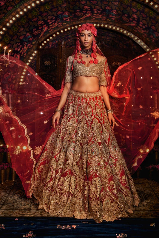 Deep Red Cutwork Lehenga with motifs comprising of bejewelled peacocks and floral vines