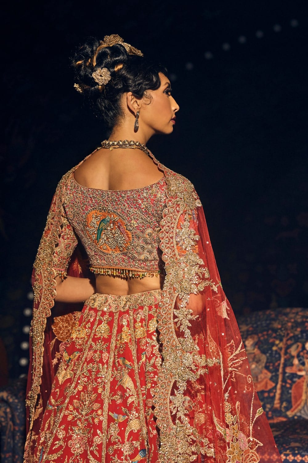 Deep Red Cornucopia Lehenga with Floral and Avian Artworks