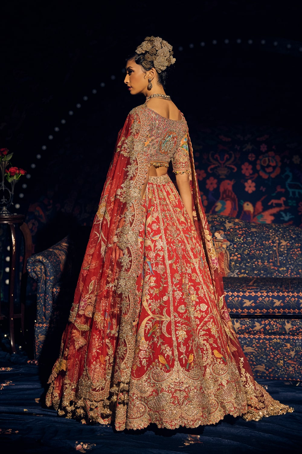 Deep Red Cornucopia Lehenga with Floral and Avian Artworks