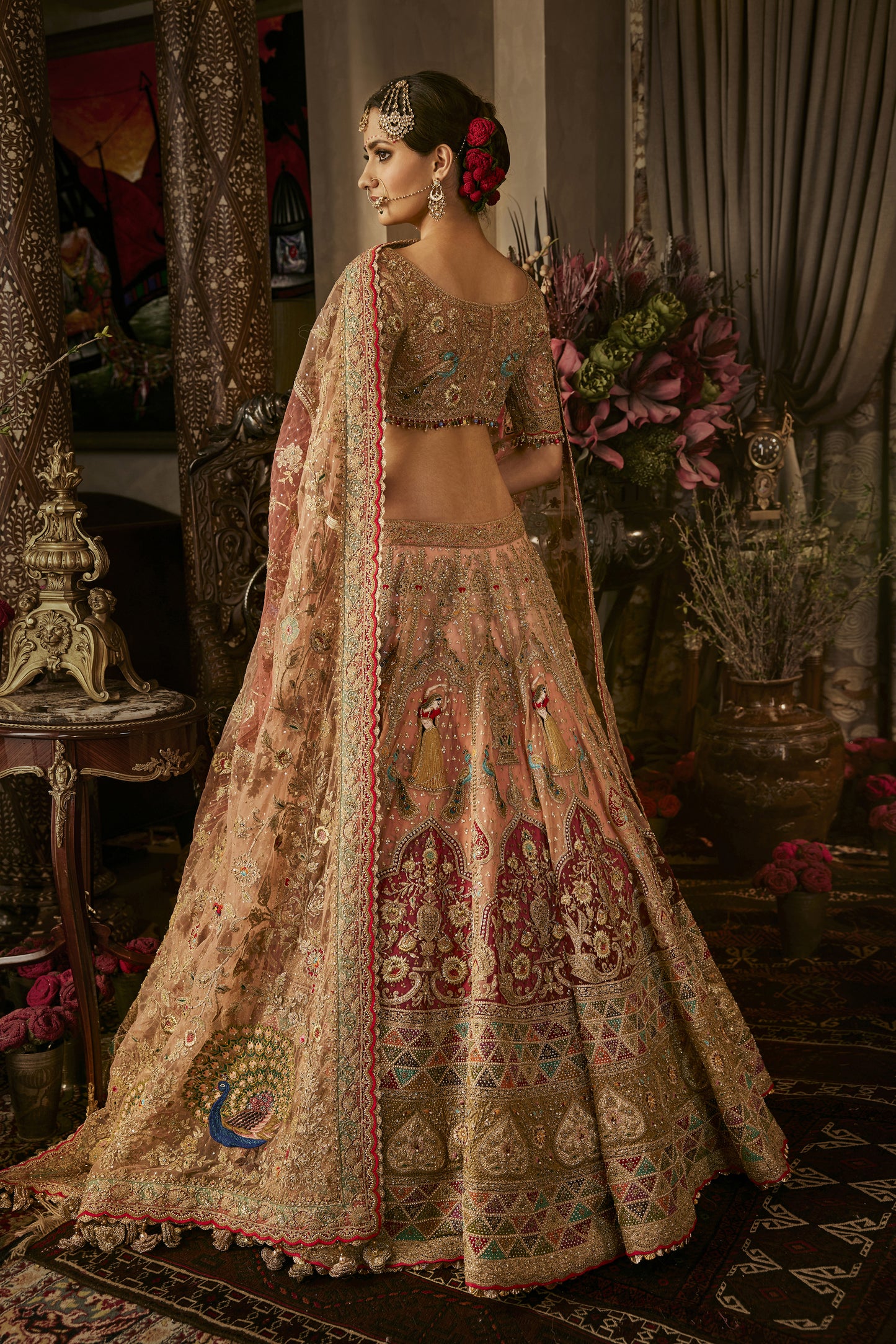 Peach Hued Dancing Figures Lehenga