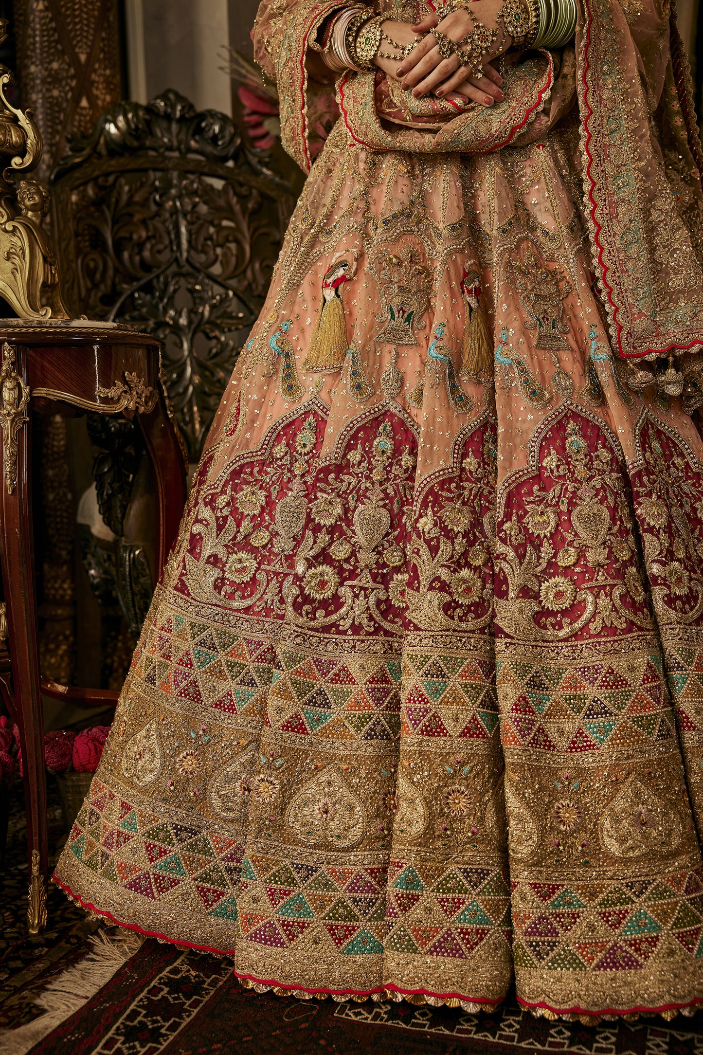 Peach Hued Dancing Figures Lehenga