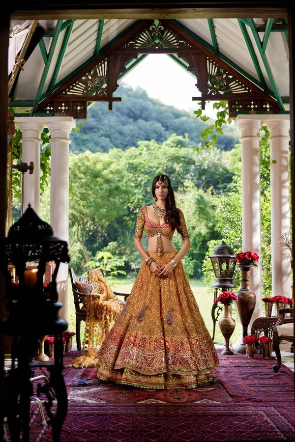 Mustard Yellow Lehenga set Rimple & Harpreet